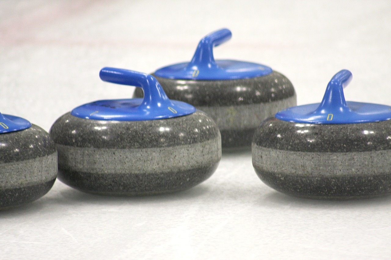 Curling Stones awaiting their athletes.