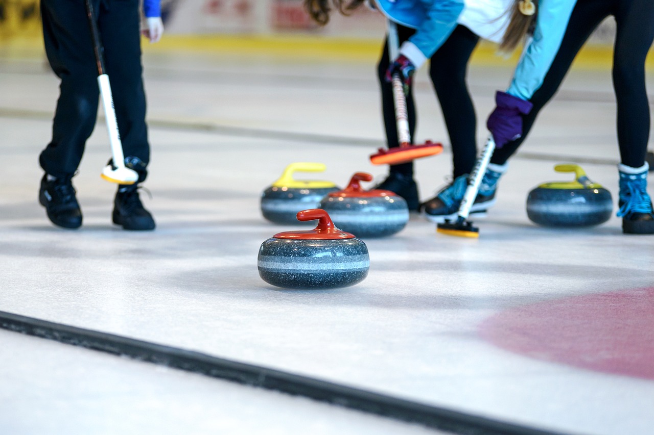 Curling Brooms in the game.